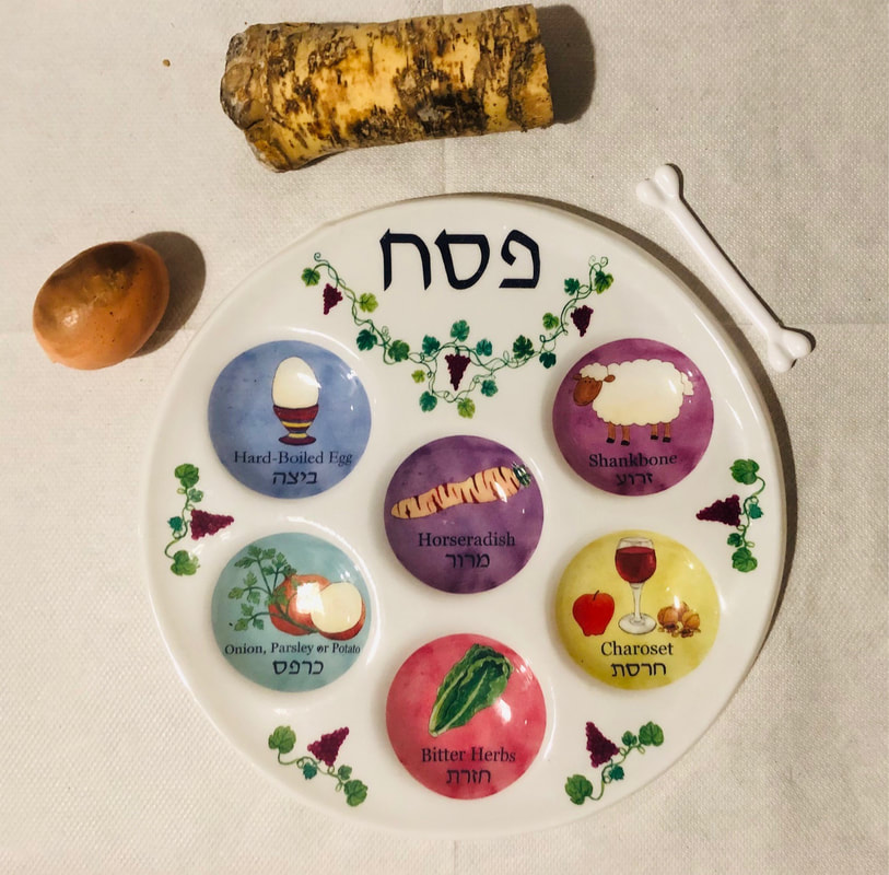 Seder plate, egg, bone, and horseradish chunk
